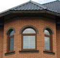 Арочные металлопластиковые окна Rehau со шпросами.