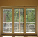 Раздвижные окна - двери типа -гармошка- в закрытом положении.