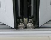 Нижний опорный ролик двери гармошка Reynaers CF 77